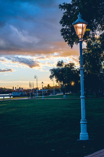 Lamp post against sunset